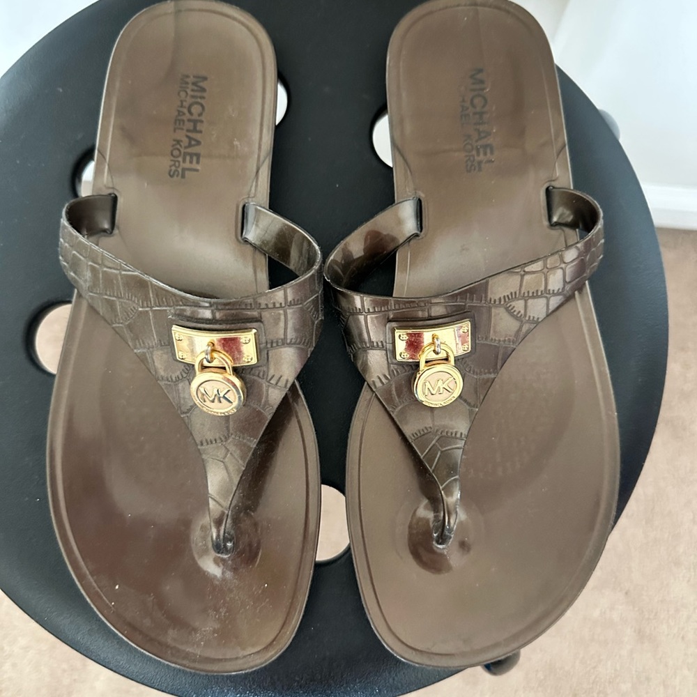 Micheal Kors plastic flats with gold lock
